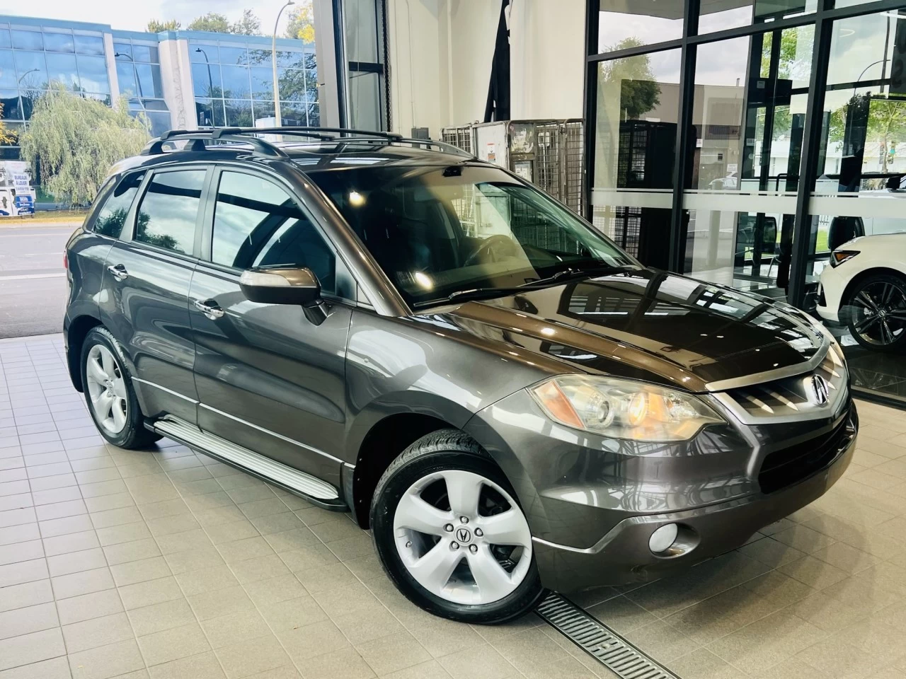 2009 Acura RDX AWD 4dr https://www.acuramontrealcentre.com/resize/b990ff35b810a3abc0cc817b2ca24889-1