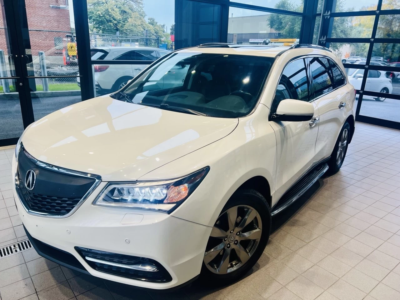 2014 Acura MDX Elite Pkg https://www.acuramontrealcentre.com/resize/b990ff35b810a3abc0cc817b2ca24889-1