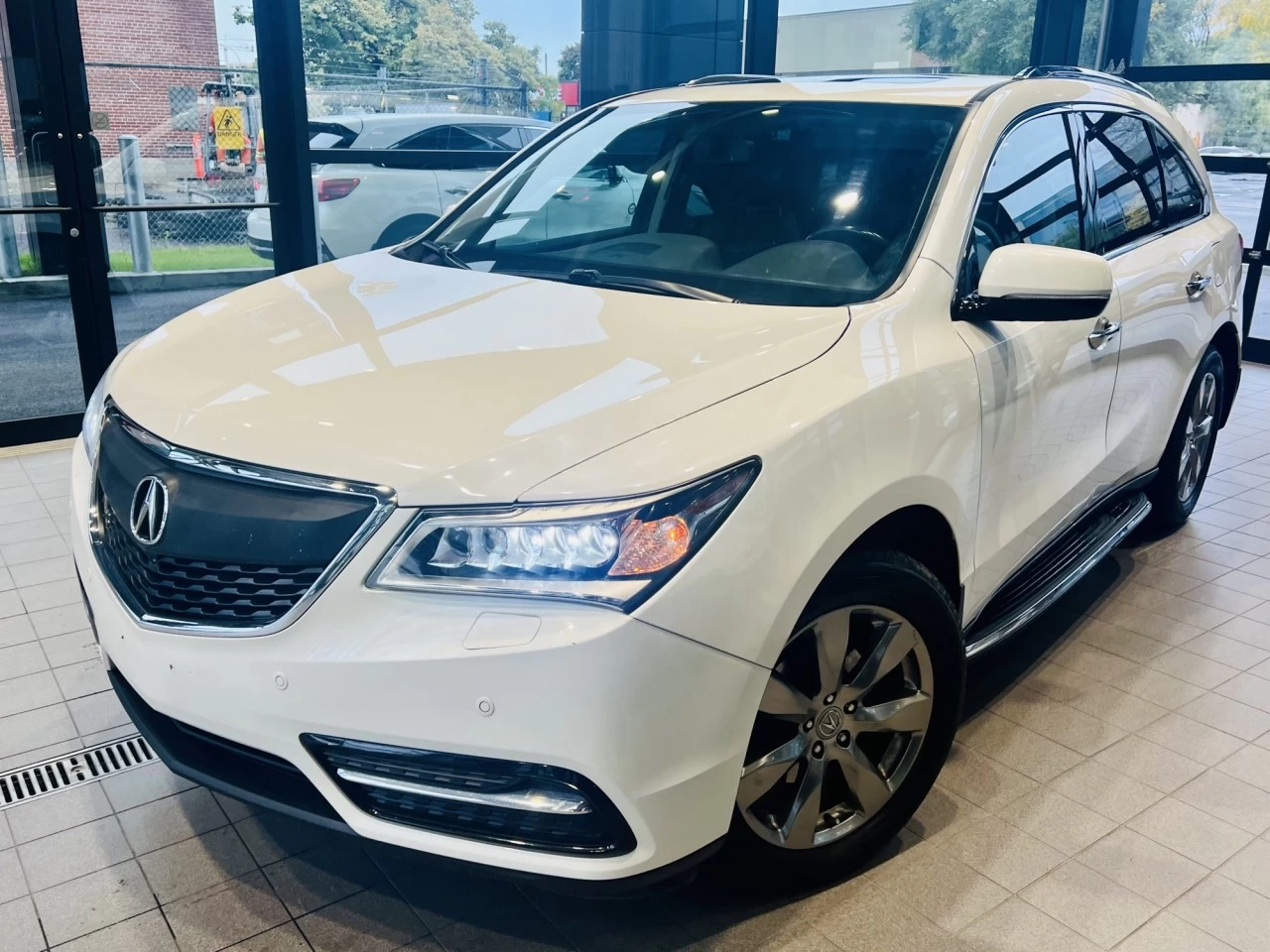 2014 Acura MDX Elite Pkg https://www.acuramontrealcentre.com/resize/b990ff35b810a3abc0cc817b2ca24889-1