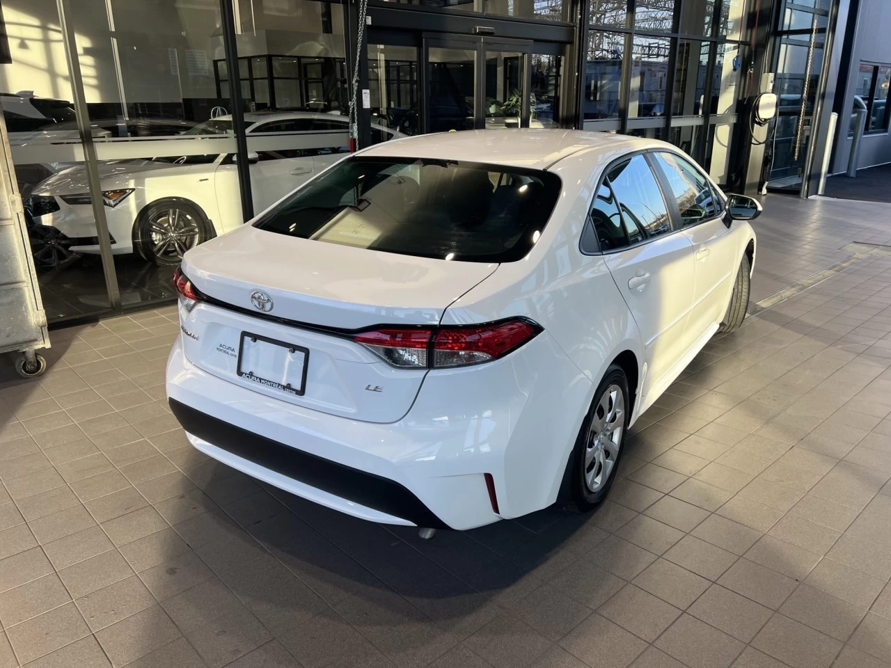 2021 Toyota Corolla LE https://www.acuramontrealcentre.com/resize/b990ff35b810a3abc0cc817b2ca24889-1