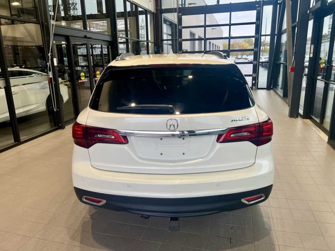 2014 Acura MDX Elite Pkg https://www.acuramontrealcentre.com/resize/b990ff35b810a3abc0cc817b2ca24889-1