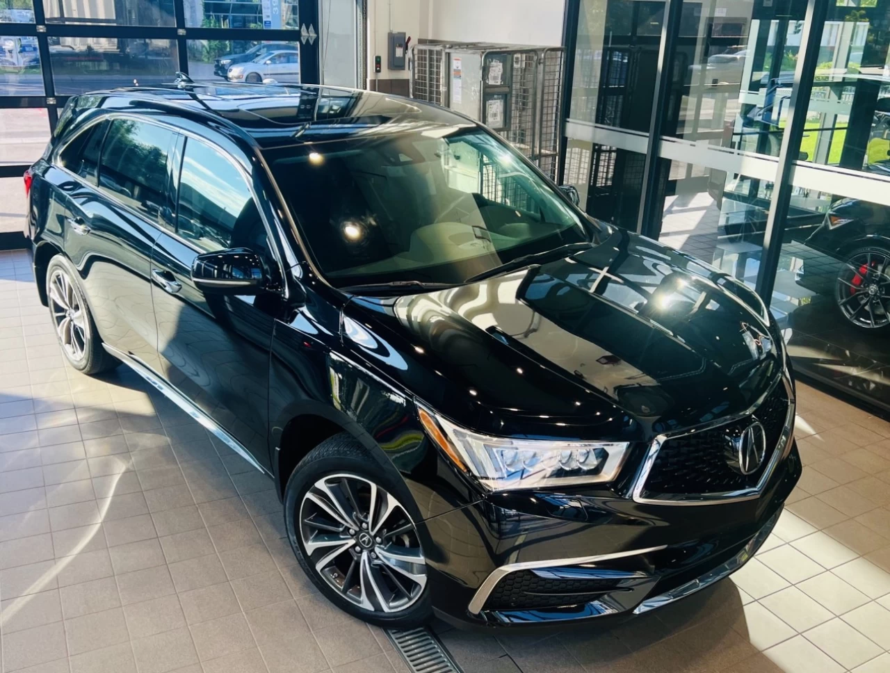 2020 Acura MDX Tech https://www.acuramontrealcentre.com/resize/b990ff35b810a3abc0cc817b2ca24889-1