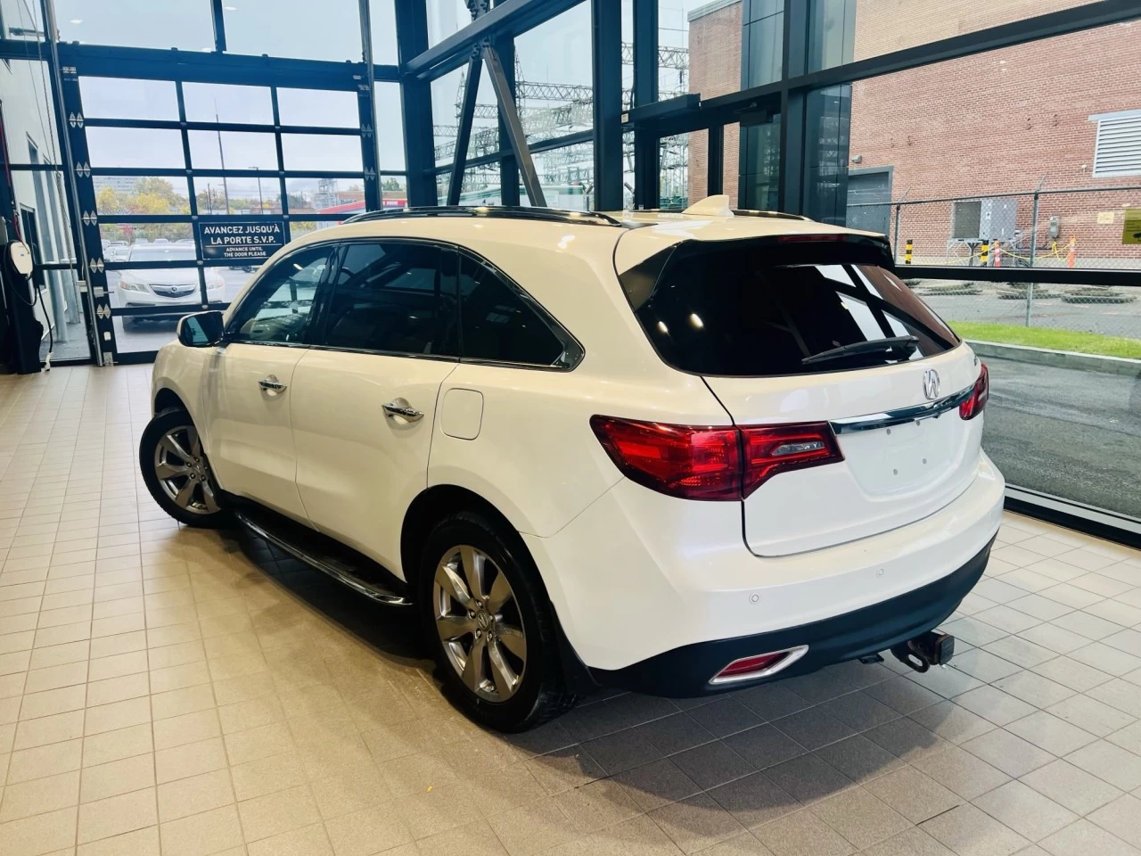 2014 Acura MDX Elite Pkg https://www.acuramontrealcentre.com/resize/b990ff35b810a3abc0cc817b2ca24889-1