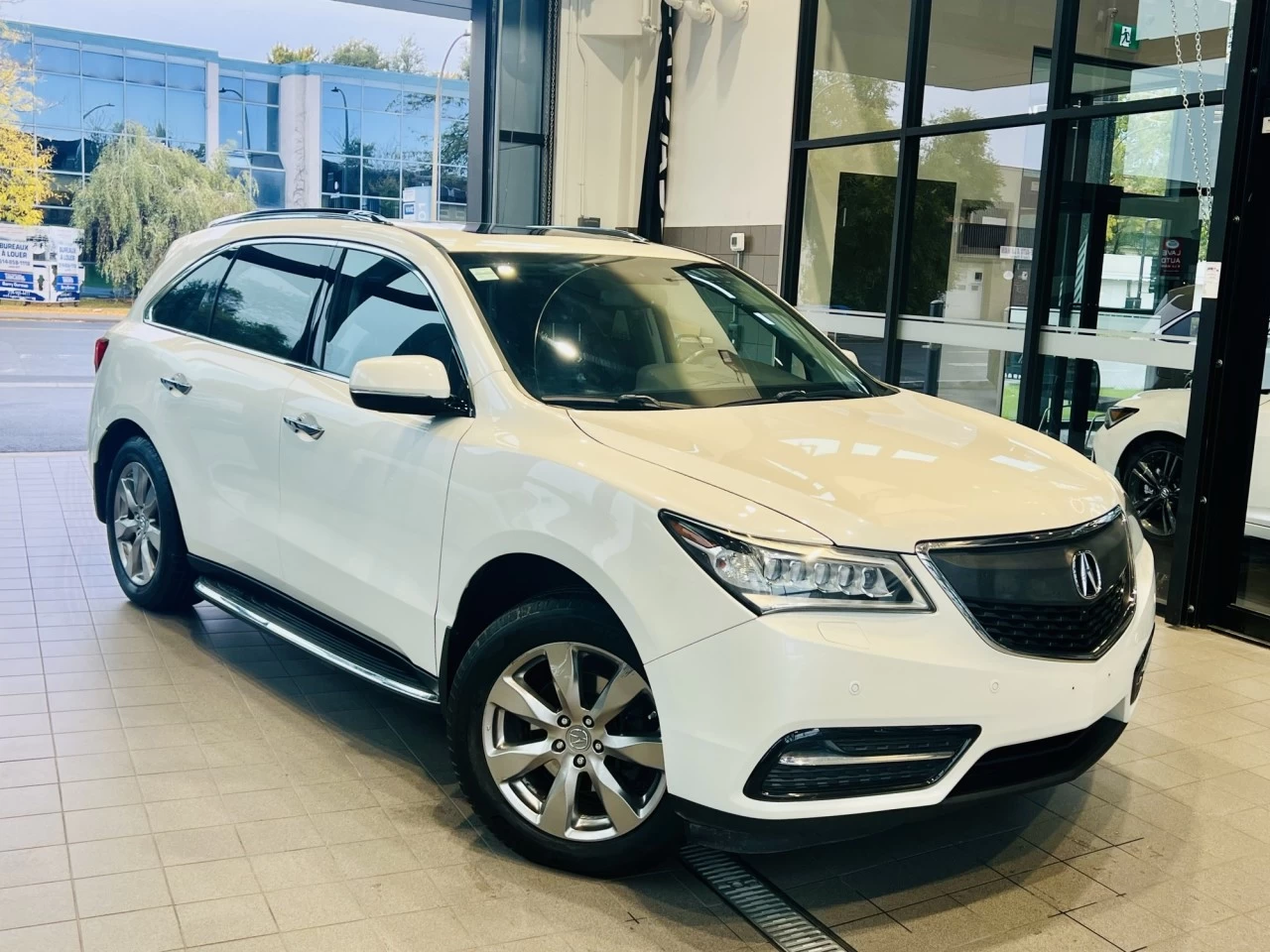 2014 Acura MDX Elite Pkg https://www.acuramontrealcentre.com/resize/b990ff35b810a3abc0cc817b2ca24889-1