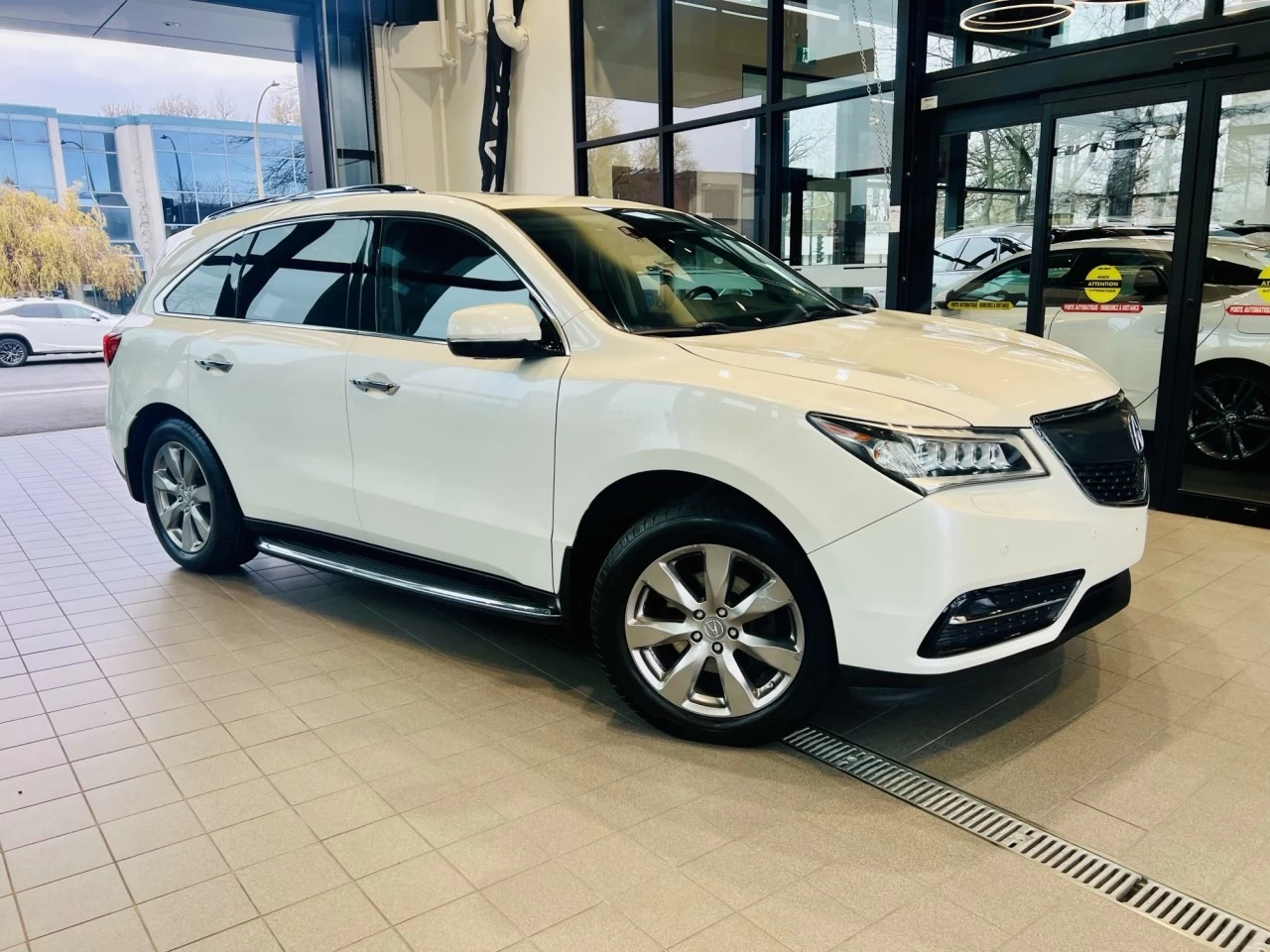 2014 Acura MDX Elite Pkg https://www.acuramontrealcentre.com/resize/b990ff35b810a3abc0cc817b2ca24889-1