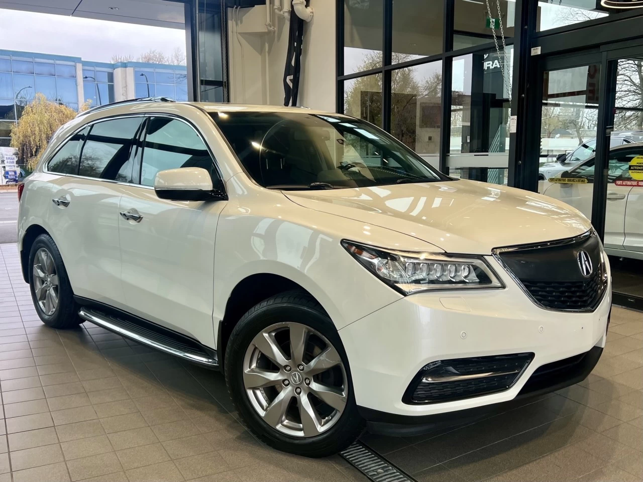 2014 Acura MDX Elite Pkg https://www.acuramontrealcentre.com/resize/b990ff35b810a3abc0cc817b2ca24889-1