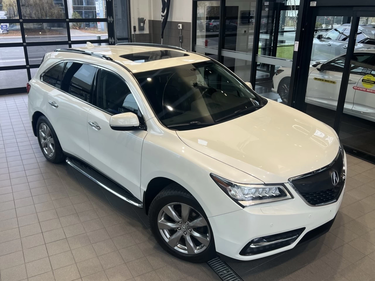 2014 Acura MDX Elite Pkg https://www.acuramontrealcentre.com/resize/b990ff35b810a3abc0cc817b2ca24889-1